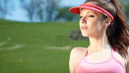 Girl in sport on the nature