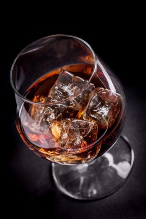 Whiskey Cognac on black background
