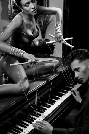 Seductive woman on the piano