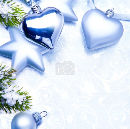 Christmas silver decoration on blue background