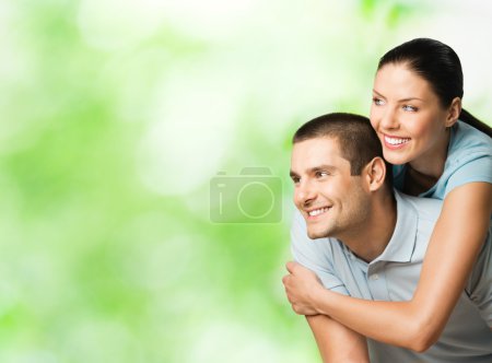 Portrait of happy couple, outdoors