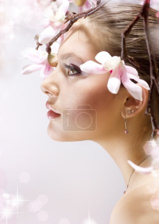 Beautiful Spring Girl with flowers