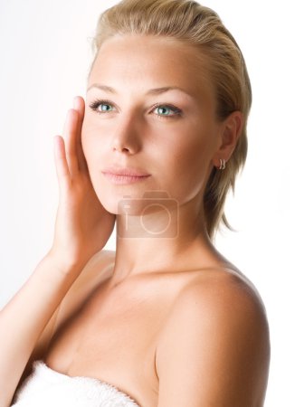 Beautiful Young Woman Touching Her Face. Perfect Skin