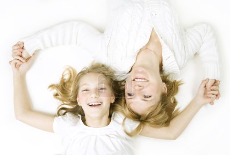 Happy Family. Mother With Teenage Daughter Over White
