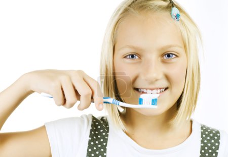 Healthy Teeth. Little Girl brushing her teeth