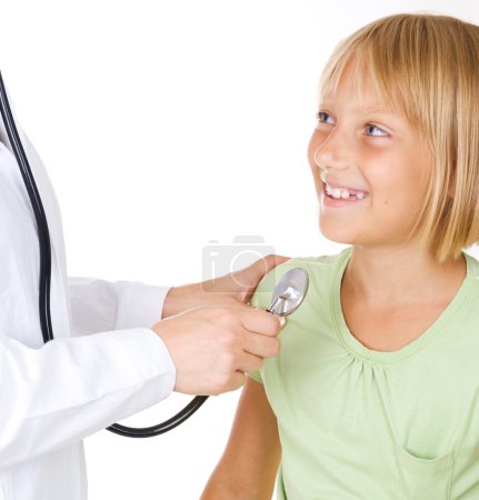 Happy Little Patient. Doctor Examining The Child Girl. Isolated
