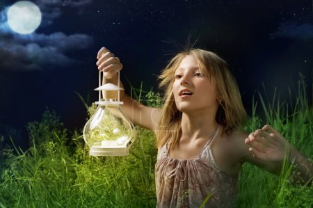 Little Girl Running On A Green Field. Mystical Night