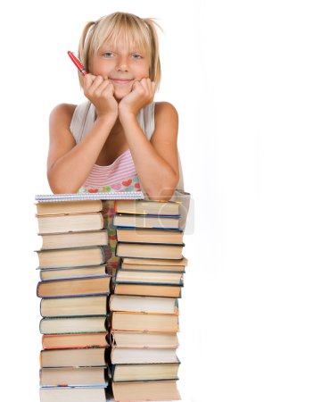 Back To School Concept. School Girl Above The Heap Of Books