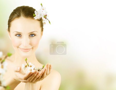 Beautiful Young Woman With Spring Blossom