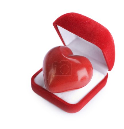 Red velvet Gift Box with a heart on a white background. Valentin