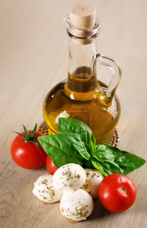 Olive Oil With Mozzarella, Tomato And Fresh Basil