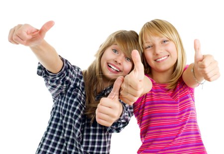 Portrait of happy teen girls showing thumbs up isolated one whit
