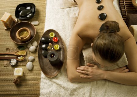 Spa Woman. Hot Stones Massage