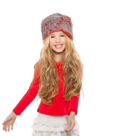 Kid girl winter dancing with red shirt and fur hat