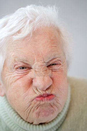 Senior Woman Grimacing