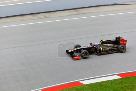 SEPANG, MALAYSIA - APRIL 8: Vitaly Petrov (team Lotus Renault) a