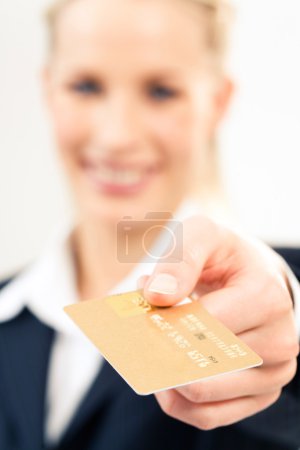 Image of plastic card in human hand