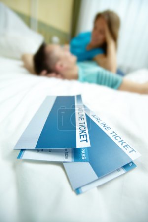 Tickets on bed