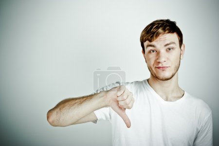 Man with thumb down