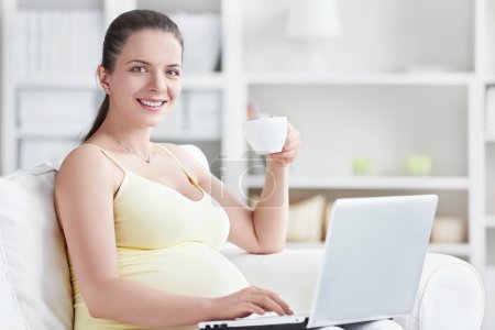 Pregnant with a laptop