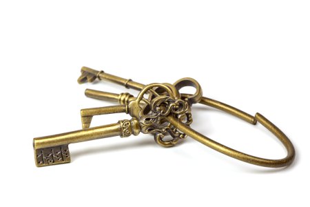 Old Brass Key Isolated on White