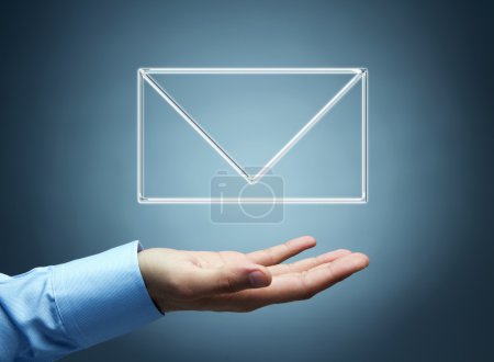 Male hand presenting virtual mail icon