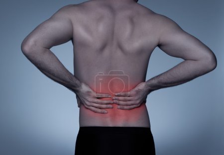 Young adult with back pain