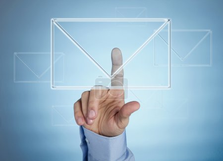Human hand pressing virtual mail icon