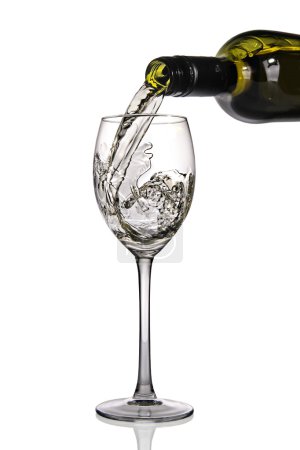 White wine poured into glass