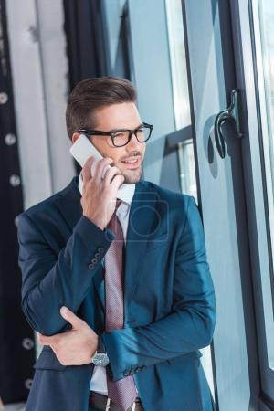 businessman talking on smartphone