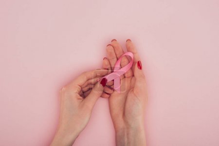 hands with Breast cancer awareness ribbon