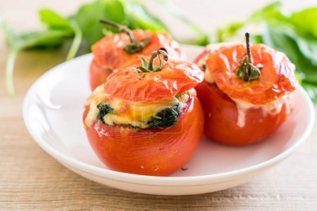  baked tomatoes stuffed with cheese and spinach 