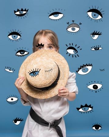 Girl with straw hat and eyes