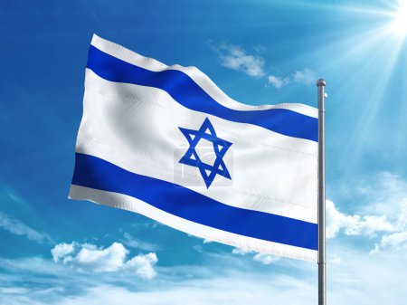 Israeli flag waving in the blue sky