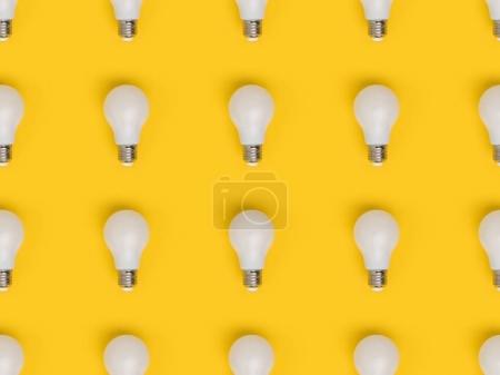 full frame of arrangement of light bulbs isolated on yellow