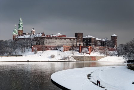 Wawel Castle in Krakow and Vistula river in winter