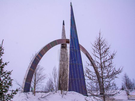 Salekhard, Yamal-Nenets Autonomous Region, Russia - March 4, 2020. Monument, stela 66 parallel - a symbol of the city in the Arctic Circle. Copy space