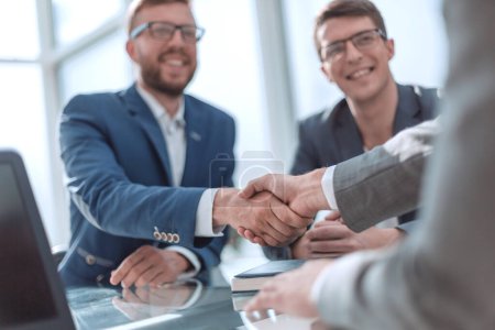 close up. successful business people shaking hands