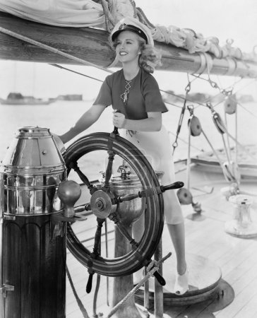 Portrait of woman steering boat