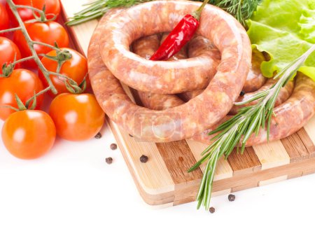 Sausage from pork and beef, tomatoes, salad and spices