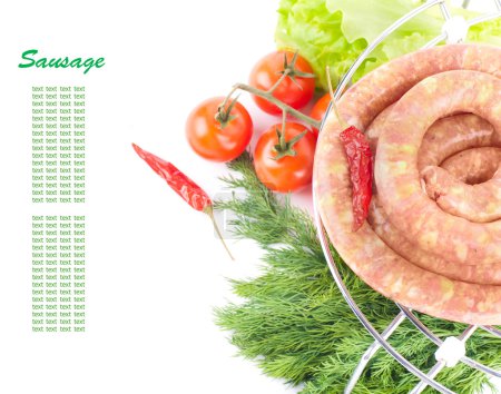 Sausage from pork and beef on a grill, tomatoes, salad and spices