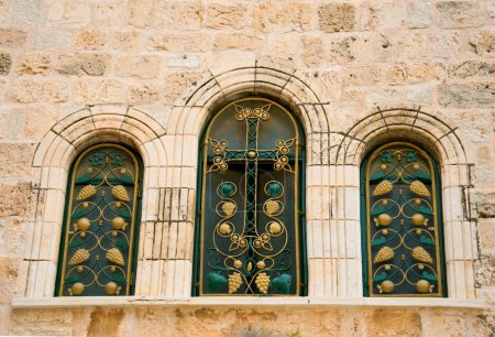 Narrow stone windows of ancient Tel Aviv, Israel