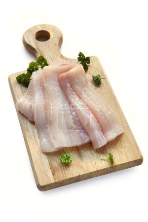 Raw Fish Fillets on Board over White