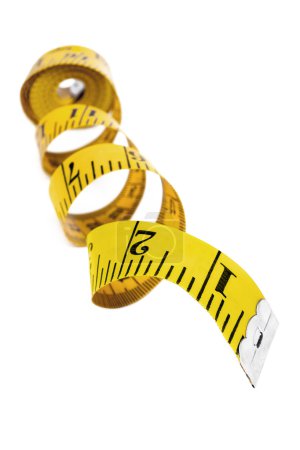 Yellow Tape Measure over White