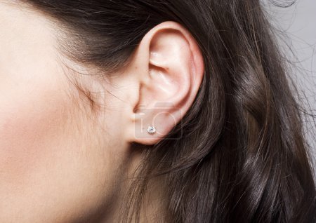 Young woman ear closeup