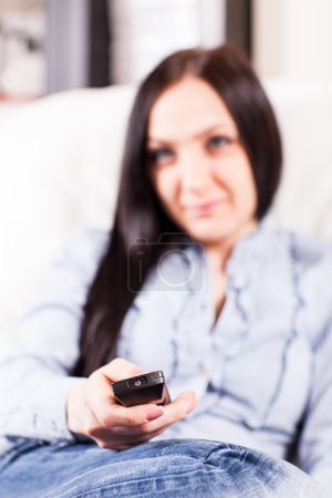 Woman with remote control