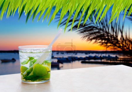Cocktail Mojito in Balearic island sunset