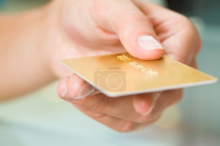 Holding credit card