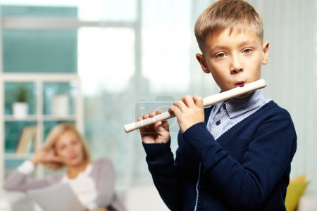 Young flute player