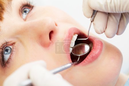 Examining mouth